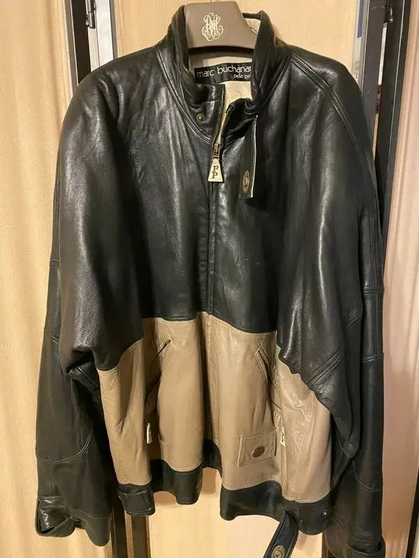 Stylish-Black-and-Brown-Leather-Jacket-by-Pelle-Pelle.webp Stylish Black and Brown Leather Jacket by Pelle Pelle - Image 1