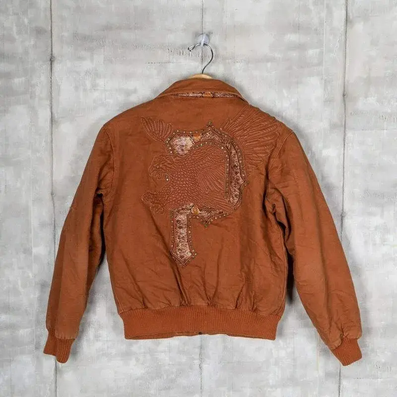 Vintage-Brown-Army-Jacket-Marc-Buchanan-the-pelle-pelle.webp Vintage Brown Army Jacket | Marc Buchanan the pelle pelle - Image 1